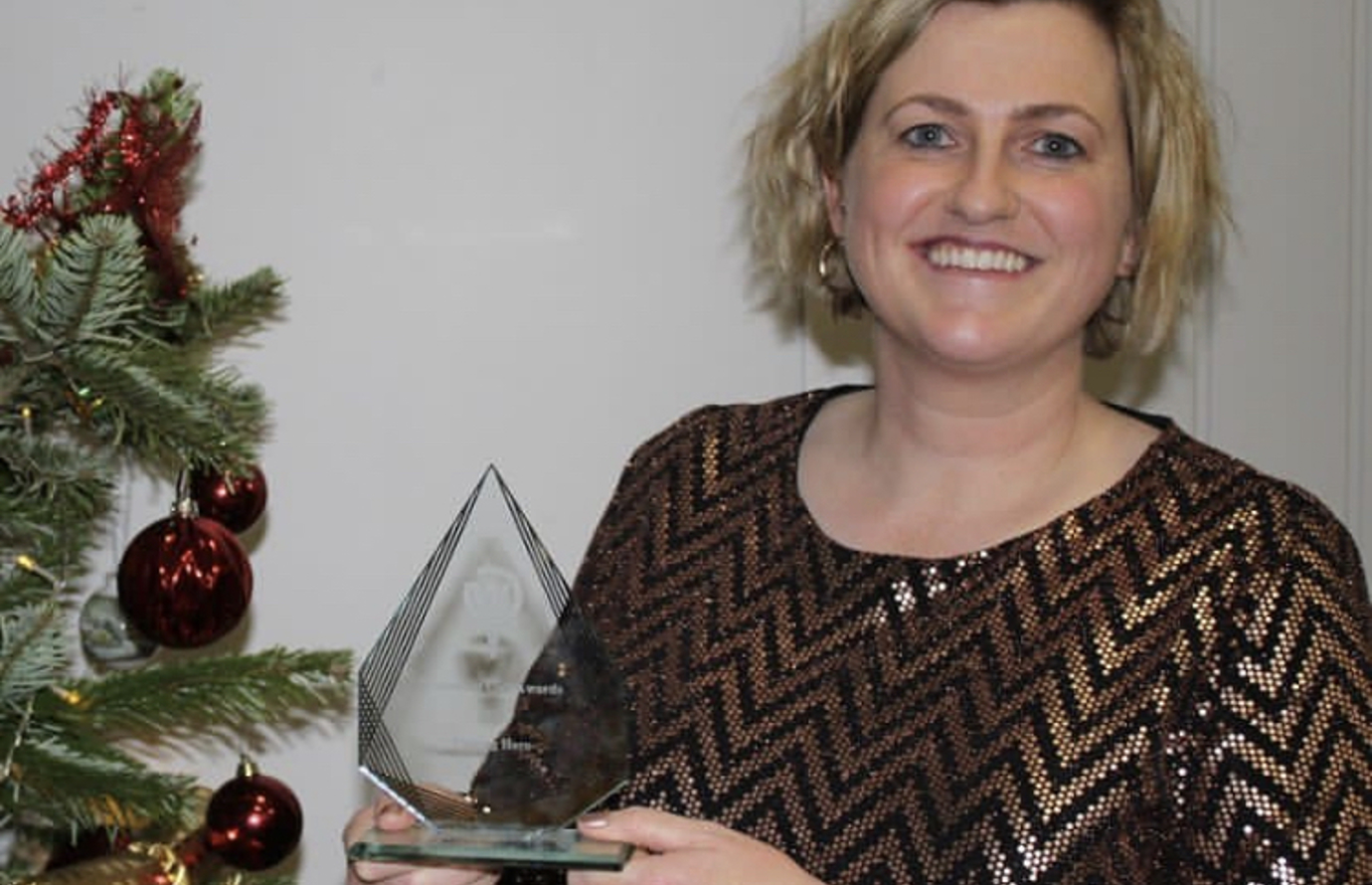 emma-winning-the-unsung-hero-award-at-the-inugural-women-in-golf-awards-in-2022.jpeg