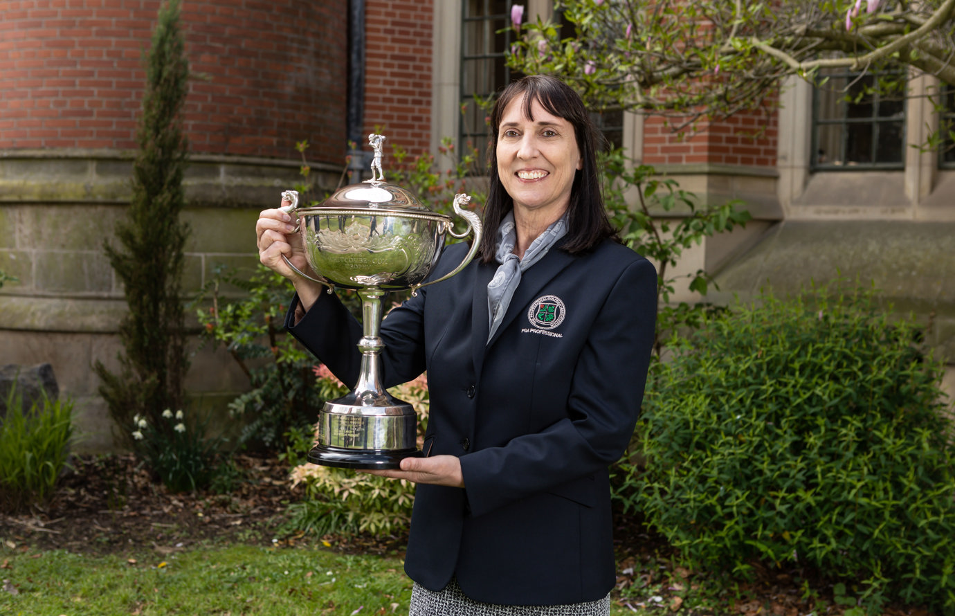 23graduation_stellamcclure_whitcombetrophy2.jpg
